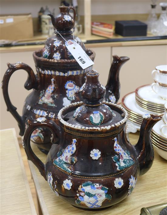 Two Measham pottery barge teapots